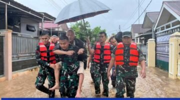 Hujan Deras Rendam Pemukiman, TNI Turun Tangan Evakuasi Warga di Padang